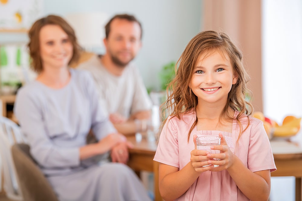 family drinking clean water